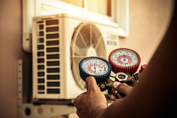 Professional Hvac technician working in Pembroke, VA